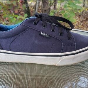 Vans Blue and White Sneakers with Low-Top Design and Classic Style